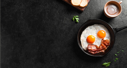 Fried eggs and bacon for breakfast