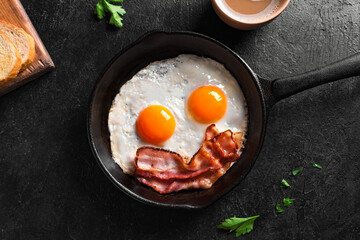 Fried eggs and bacon for breakfast