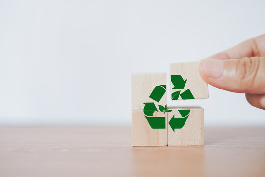 Hand Arranged Green Recycle Sign On Wooden Cube Block For CSR, Eco Green Sustainable Living, Zero Waste, Plastic Free, Earth Day, World Environment Day, Responsible Consumption Social Responsibility