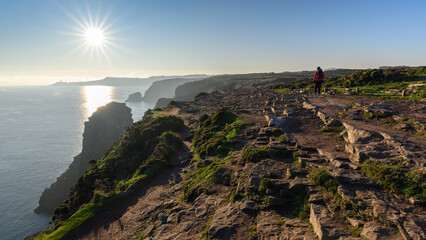 Cap Frehel sunrise on the cliff during the hiking