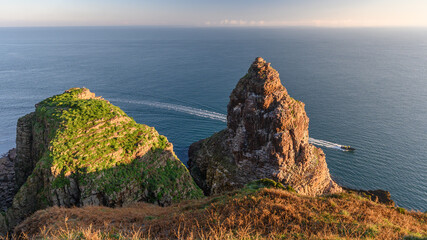 Cap frehel seascape from the cliff with boat line and rock.