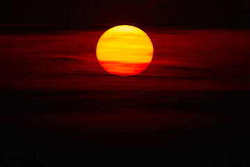 Tropical sunset sunrise over the ocean sea horizon.