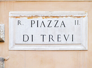 Piazza di Trevi street sign in Rome, Italy, Landmark of Rome, Close-up view of Piazza di Trevi street sign