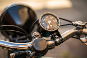 Fototapeta na wymiar Ancient motorcycle odometer handlebar