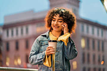 Happy Young Woman Using Phone