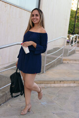 Obraz premium Hispanic businesswoman smiling while looking the other way