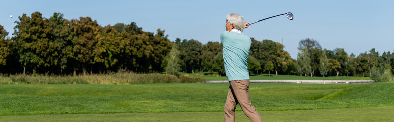 asian senior man playing golf, banner.