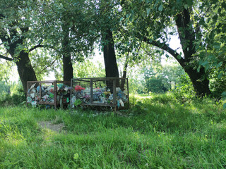 Big trash bin in the forest. Cleaning nature concept. Trash can in the park.