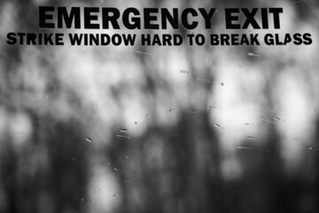 emergency window on train. emergency exit. close-up. inscription.