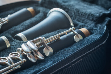 clarinet inside musical instrument storage case closeup - obrazy, fototapety, plakaty