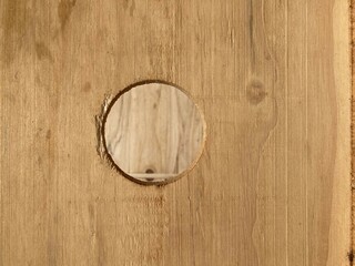 a round hole in a plywood panel
