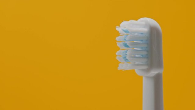Close-up view of Electric ultrasonic toothbrush bristles.