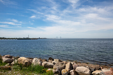 View of the Baltic Sea from Ribersborg beach with Oresund Bridge on the horizon, Malmo, Sweden