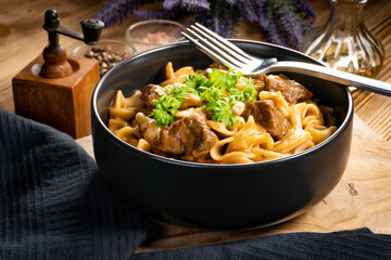 Tagliatelle mosse with beef sauce.