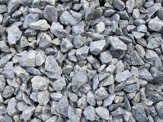 heaped up light gray ballast stones