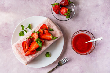 Italian strawberry dessert Semifreddo with sauce - cold dessert like an ice-cream