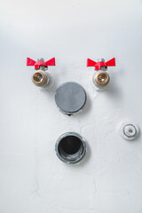 holes in the wall for water pipes in the house