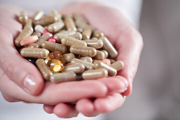 pills on the woman's hands