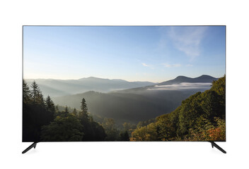 Modern wide screen TV monitor showing beautiful mountain landscape isolated on white