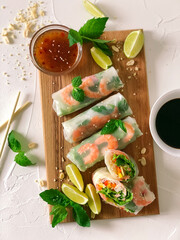 Spring roll with seafood and vegetables in rice paper.