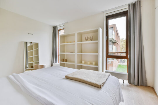 Modern Interior Of Bedroom With Bed