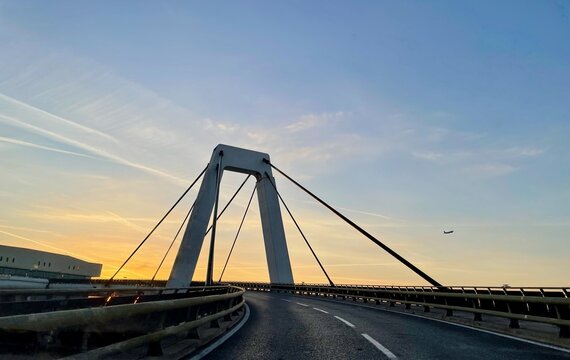 Milano, Italy, 12.04.2022. View of terminal 1 and bridge at Malpensa airport at sunrise.