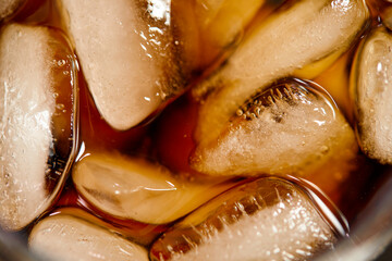  Ice cubes in cola beverage