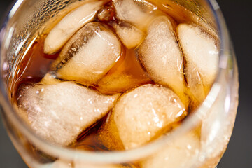  Ice cubes in cola beverage