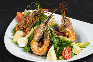 Langoustines dish on a plate in a cafe, seafood delicacies.