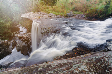 Penpobmai Waterfall - Phu Kradueng National Park. It is a sandstone mountain peak cut. It has a high point of 1,316 m. The mountain’s steep sides are home of tropical forest.