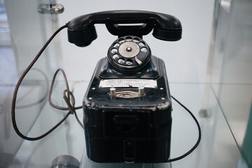 old retro black dial telephone with numbers