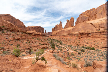 Fototapeta premium Arches National Park at Midday - Arches has many arches including the famous Delicate Arch, the Window Arch, the Double Arch and other features such as Tower of Babel, Turret Arch, and the Courthouse 
