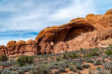 Arches National Park at Midday - Arches has many arches including the famous Delicate Arch, the Window Arch, the Double Arch and other features such as Tower of Babel, Turret Arch, and the Courthouse 