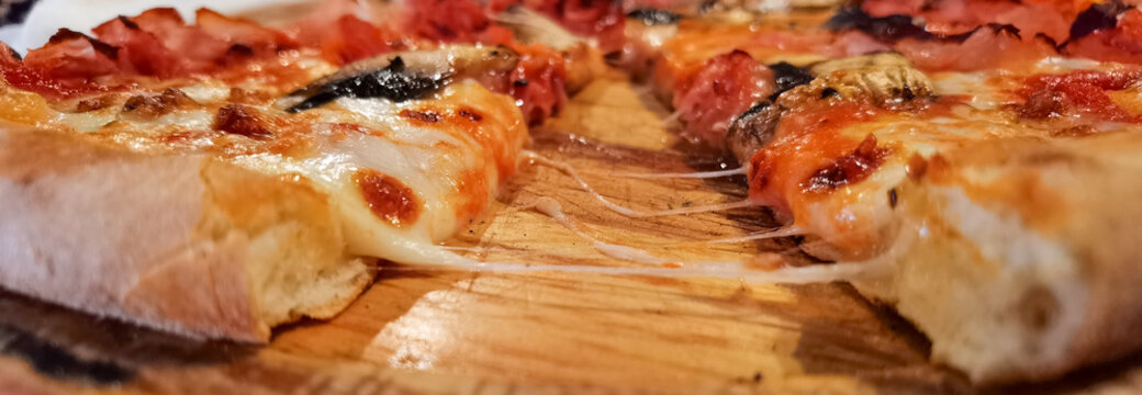 pizza in the oven with woods and fire fresh preparing cooking indoor
