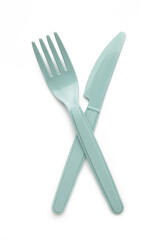 Top view of black plastic disposable fork and knife isolated on white