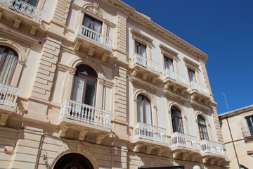 ancient stone building (palace ?) at minerva square in siracusa in sicily (italy) 