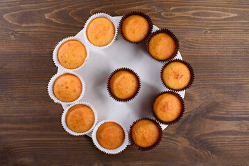 top view homemade cupcake on wooden background