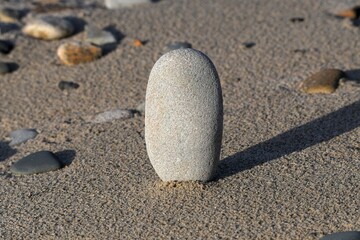 Beautiful pebbles on the sand