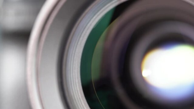 Macro Shot of Camera Lens with Flare on Optical Glass. Process of Zooming Camera Lens