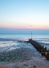 Obraz premium Reflected Light Over Hunstanton Beach, Norfolk At Sunset