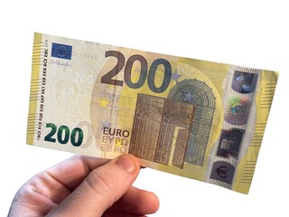 Hand holding a 200 euro banknote. White background. - obrazy, fototapety, plakaty