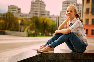 Girl walking in the city center
