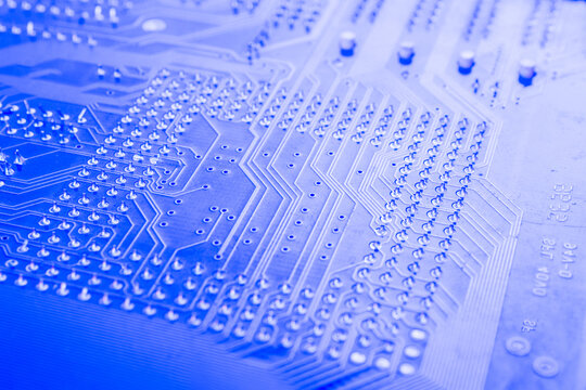 Electronic circuit, computer circuit board blue, computer technology. Circuit board futuristic technology processing. Abstract technology microelectronics concept background. Macro shot, shallow focus