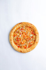 Homemade pizza with cheese and sweet peppers. On a white background.
