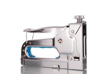 One metal stapler , close-up, isolated on a white background.