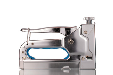 One metal stapler , close-up, isolated on a white background.
