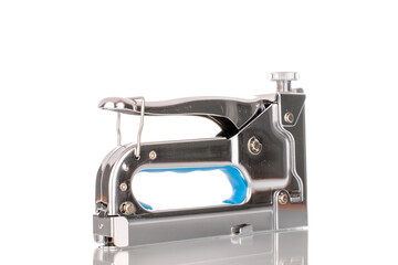 One metal stapler , close-up, isolated on a white background.