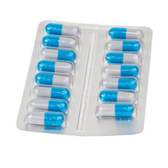 Medical pills blue in blister isolated on the white background