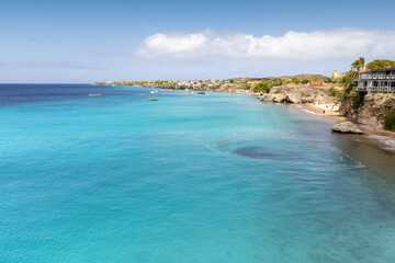 Fishing net and boats near the coast of the Caribbean island Curacao