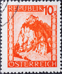 Austria - circa 1945 : a postage stamp from Austria, showing a landscape in Austria: Hochosterwitz (Carinthia)